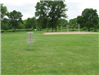 isc golf stand with volleyball court in background