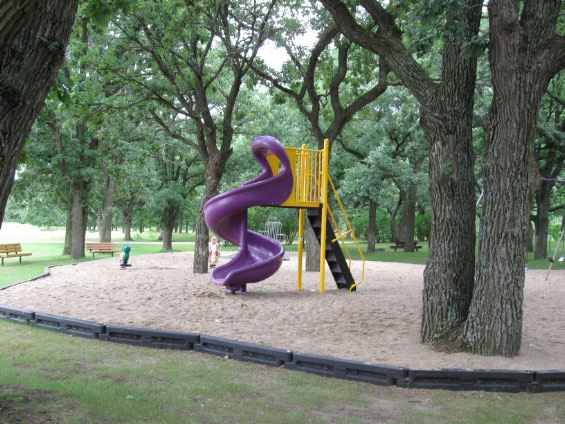 Slide and sand pit in playground