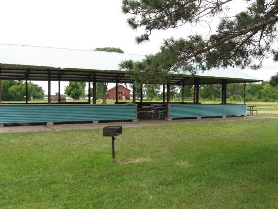 Small picnic shelter in field