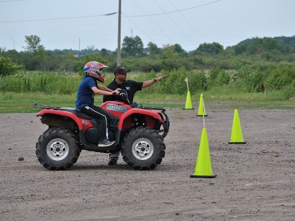 Deputy directing youth on ATV